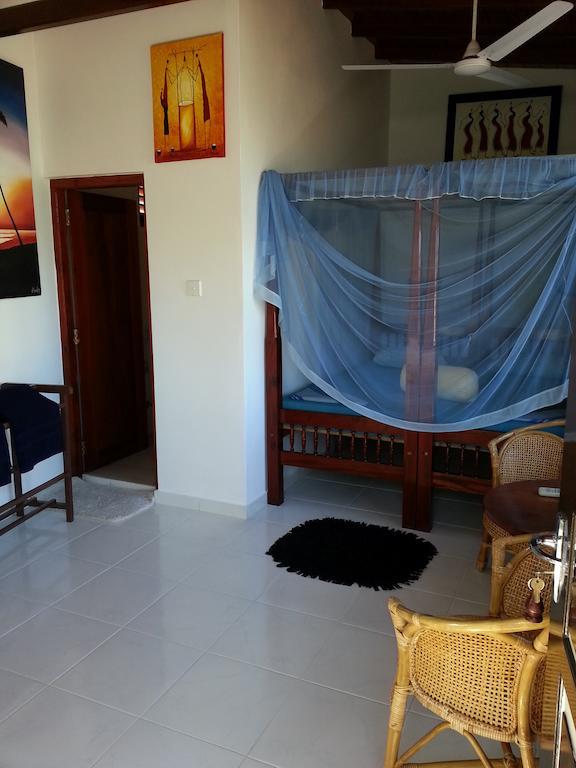 Main Reef Guest House Hikkaduwa Quarto foto
